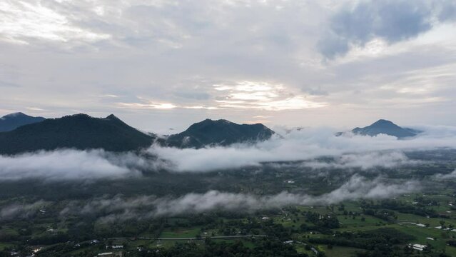 Hyper lapse timelapse of Phu Tok Mountain in Chiang Khan, Loei Thailand, Hyperlapse fog sea. Aerial view time lapse of mountain peak over misty cloud. Footage b roll 4k.