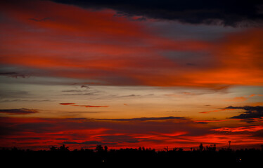 Obraz premium sky sunset clouds, Colorful Fiery orange and red sunset sky