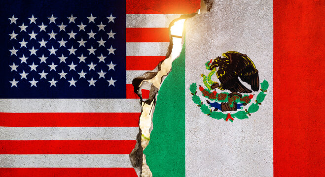 American and Mexican flags on broken cracked wall