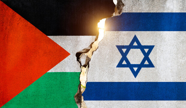 Israel and Palestine flags on broken cracked wall