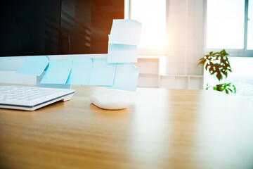 Many sticky notes on desktop computer monitor