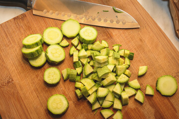 Sliced Fresh Zucchini On A Wooden Plate