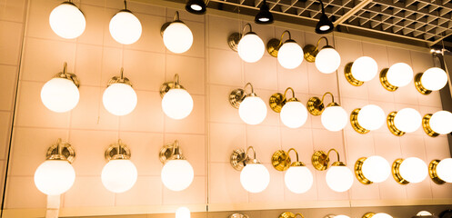 Many wall lamps in the furniture shop