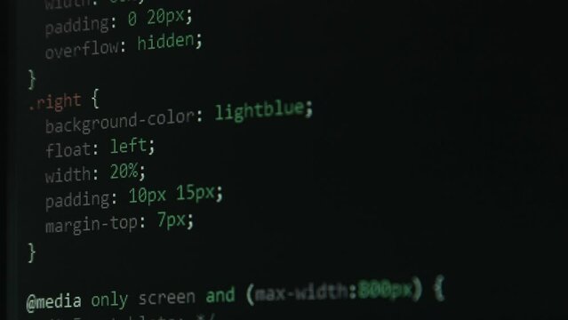 Code Screen with Different Colours being Navigated with Close Up Pixel Details HTML