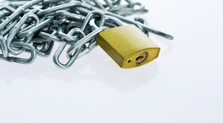 The padlock and chains isolated on white background