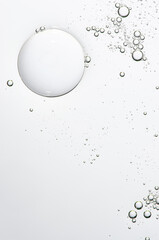 The texture of a cosmetic serum for the face or body. Closeup.