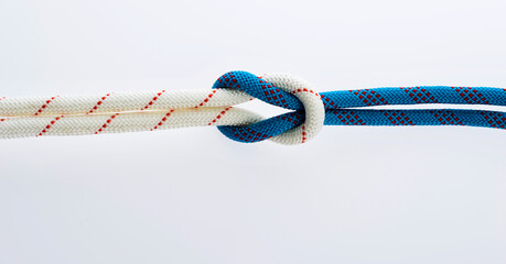 Tied rope together a knot © xy