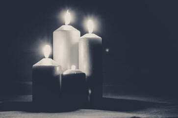 three burning advent candles