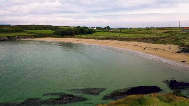 Aerial view in 4K of Siver Silver (Sn&aacute;ithe Airgid) strand in Sherkin Island, South West Cork, Ireland. Finest beach in Ireland.
