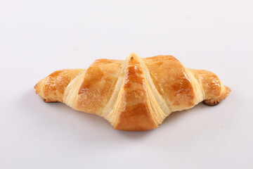 Yummy baguette sandwich with various vegetables and slices of cheese placed on white background in studio