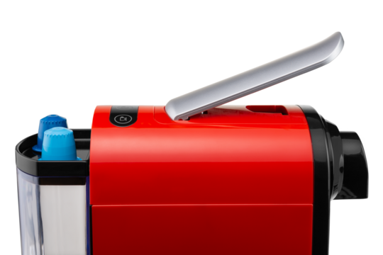 Element of a red capsule coffee machine and two capsules for making coffee, close-up, on a white background, isolate