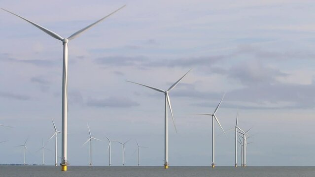 Turning Wind Turbines at Fryslan Wind Farm, Ijsselmeer, The Netherlands.2022