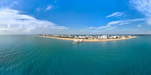 Lignano Sabbiadoro panoramica aerea della spiaggia sul mare  con cielo blu