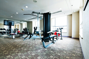 Empty gym room with equipment