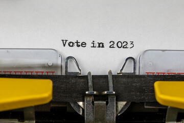 Vote in 2023 written on an old typewriter	
