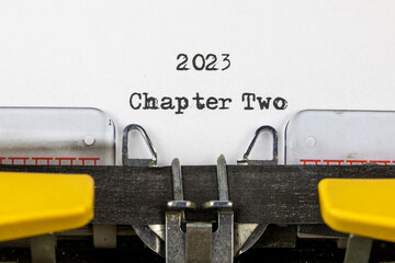 old typewriter with text 2023 chapter two	
