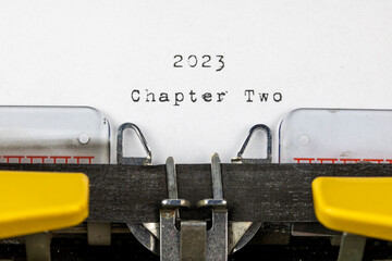 old typewriter with text 2023 chapter two	
