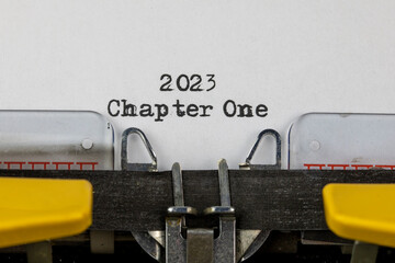 old typewriter with text 2023 chapter one	
