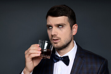 Concept of Halloween, young man on dark background