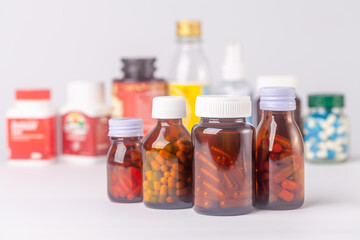 group of medicine bottle and pills