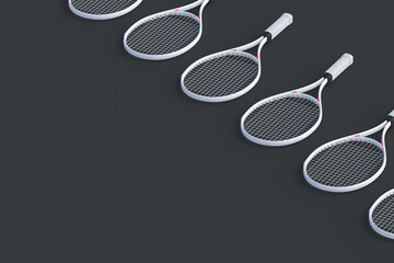 Row of modern white tennis racquets on black background. Sports equipments. International tournament. Game for laisure. Favorite hobby. Copy space. 3d render