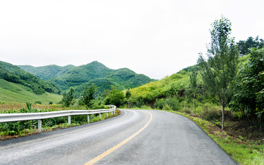 Fototapeta premium Road turning in the hills
