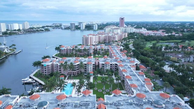 Aerial View of Boca Raton Resort and Modern Condominium Complex at Lakefront With Oceanfront Buildings in Background