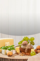 Nuts and a jar of honey, close-up