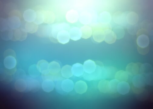 Light flares shining on blue turquoise color blur background. Bokeh pattern, lens effect, diffused glow.