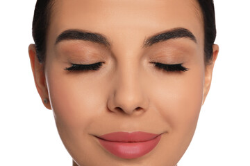 Fototapeta premium Beautiful young woman with long eyelashes on white background, closeup