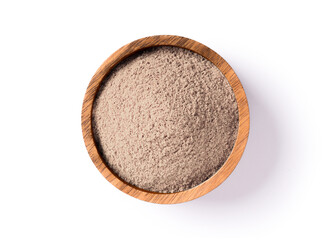 Beige color powder in wooden bowl isolated on white background. Top view. Flat lay.