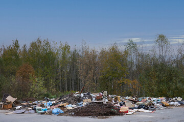 Environmental pollution concept, Garbage dump in the forest