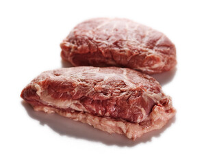 Fresh piece of meat cut from the Iberian pork cheek on white background.