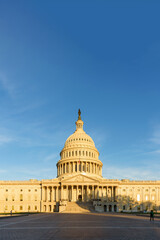 Fototapeta premium The United States Capitol in the morning with sunrise blue sky, Washington DC, Us capitol building