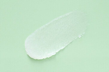 cosmetic smears scrub cream texture on pastel background	
