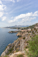 Fototapeta na wymiar Cliffs in the Mediterranean Sea in the south of Spain. White coast Spain. Valencian Community
