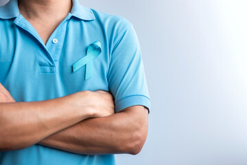Blue November Prostate Cancer Awareness month, Man in blue shirt with Blue Ribbon for support people life and illness. Healthcare, International men, Father, Diabetes and World cancer day - obrazy, fototapety, plakaty