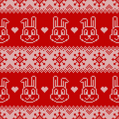 Knitted seamless pattern for 2023 new year of the rabbit. Vector background with cute bunnies, snowflakes and scandinavian ornaments. Red and white sweater print.