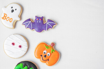 Fototapeta na wymiar Halloween funny Cookies set on white background. Trick or Threat, Happy Halloween, Hello October, fall autumn, Festive, party and holiday concept