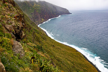 Farol da Ponta do Pargo coastline on rainy day	