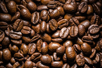 Aromatic coffee beans, background texture.