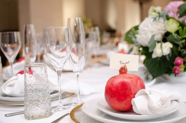 Beautiful wedding decoration. Banquet table setting and decoration. Flower decoration of wedding tables. Cutlery on the table.