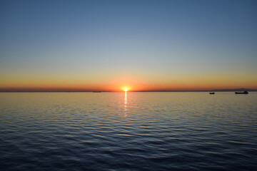 The sunset in the middle of the Mediterranean Sea.