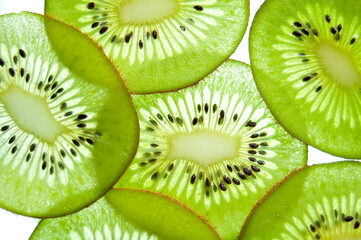Sliced kiwi fruit on the white background