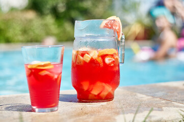 fruit cocktails by the pool