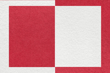 Texture of white and red paper background with geometric shape and pattern, macro. Craft garnet cardboard