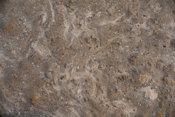 hollow wet soil surface, yellow soil, uneven undulating stretch, soil mixed with sandy soil