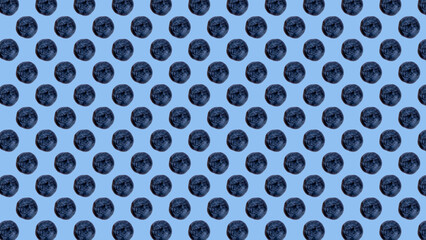 trendy colorful repeating pattern or photo of blueberries on blue background.