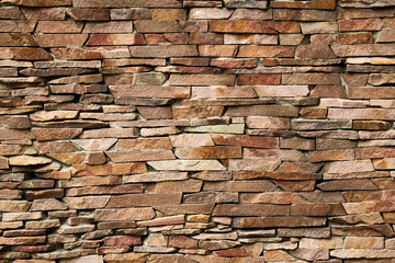 stock photo of rough stone wall with decorative structure
