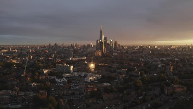 Sunrise in London, purple sly and the shard from the sky aerial drone